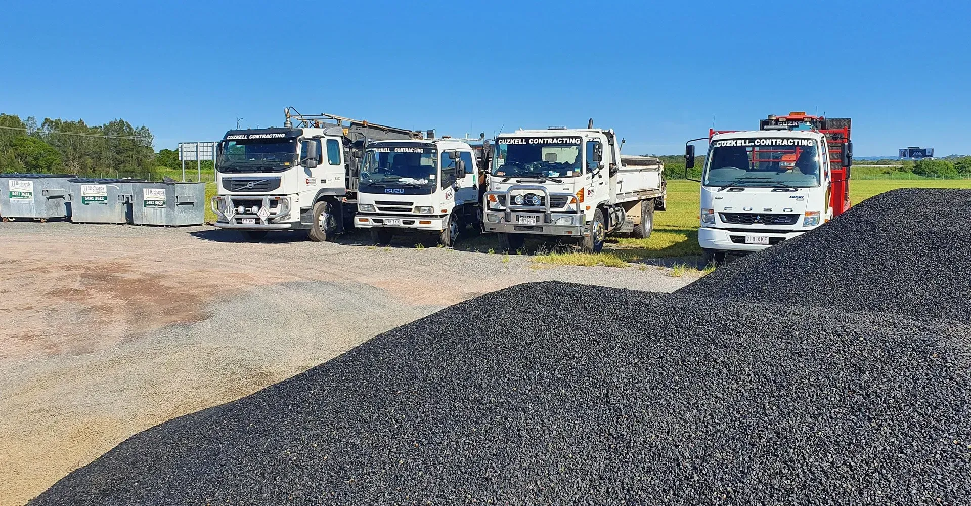 Spray sealing equipment preparing a driveway surface